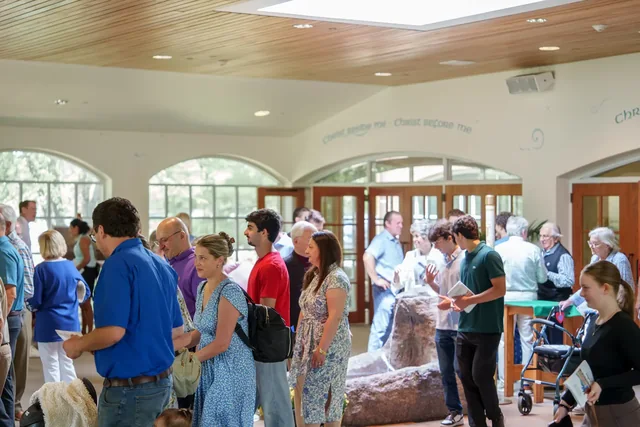 Parishioners gathering after Sunday Mass